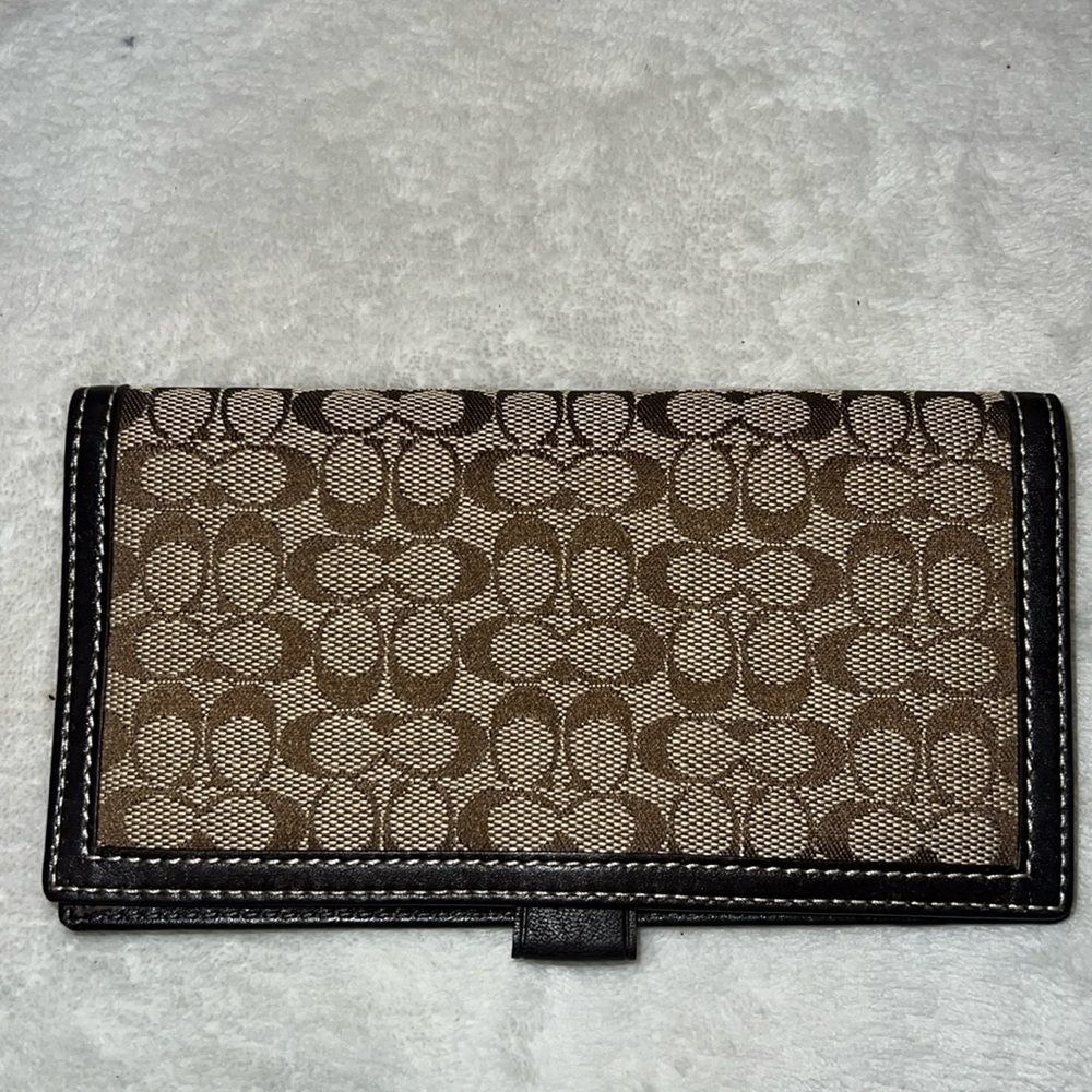 Brown coach check book holder